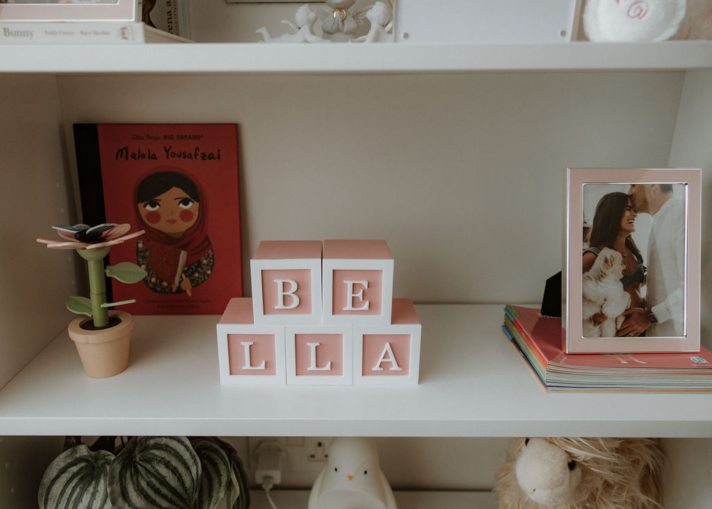 Personalised wooden name building blocks in nursery captured during in-home newborn photography session