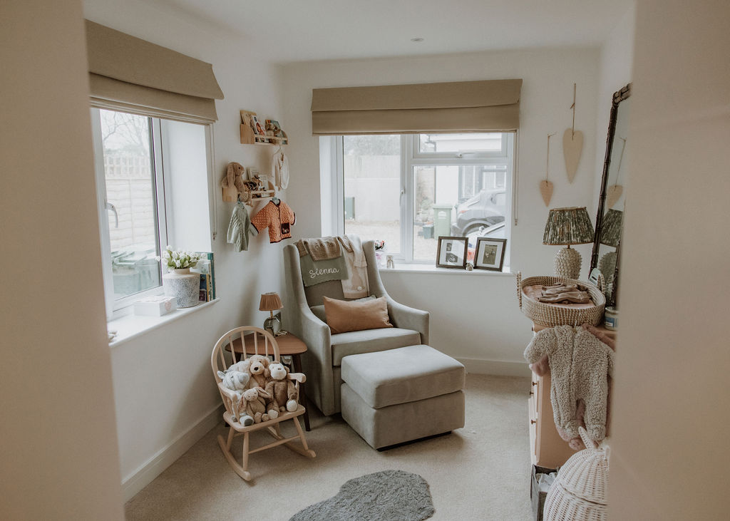 Family heirloom rocking chair in Sienna’s nursery during her Surrey newborn photoshoot, filled with nostalgic warmth.