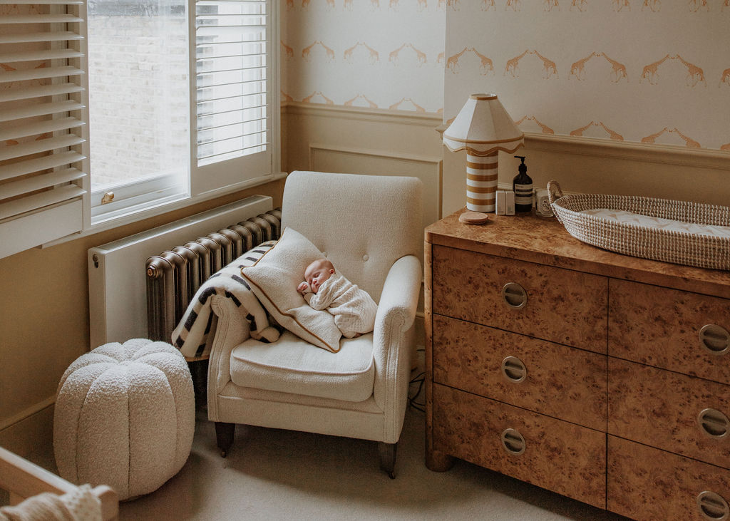 An armchair in Eira’s nursery, a quiet and restful space for her parents, photographed in a serene newborn photoshoot in Balham, London.